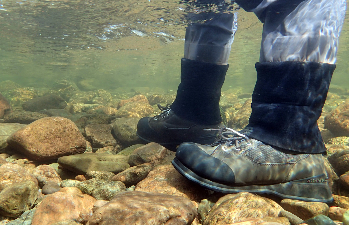 Fisherman's wading boots viewed from under water
