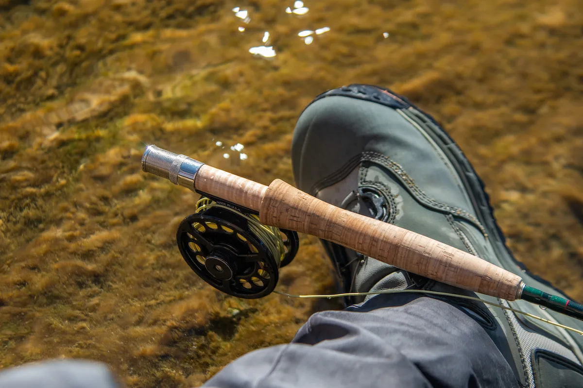 wading boots and fly rod