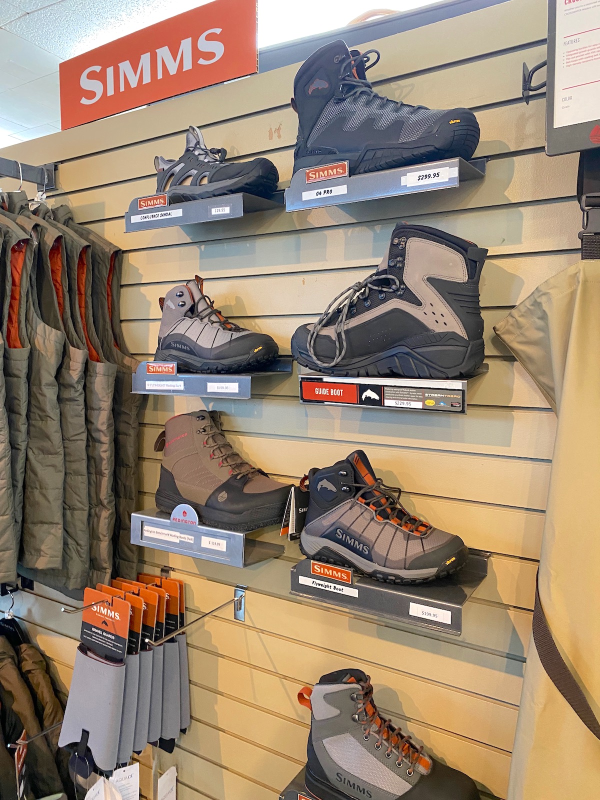 Simms fly fishing boots display at a fly fishing shop