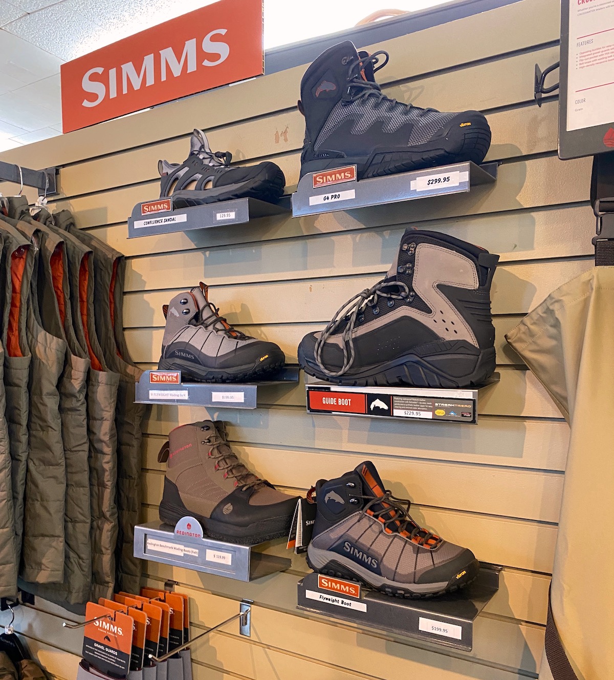 Display of fly fishing boots in a fly shop
