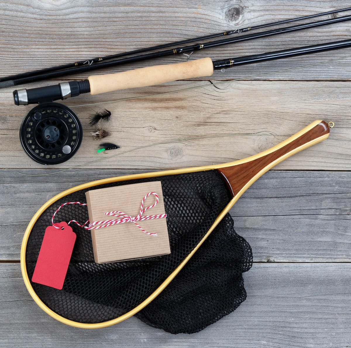 Fly rod and net with a wrapped package
